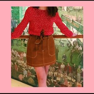 brown skirt with white stitching!